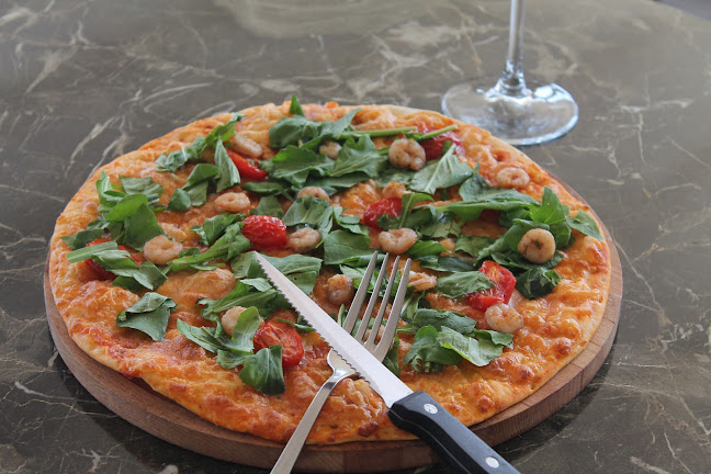 Opinii despre Gusto Port Restaurant & Cafe în İzmir - Gastronomi ve konaklama